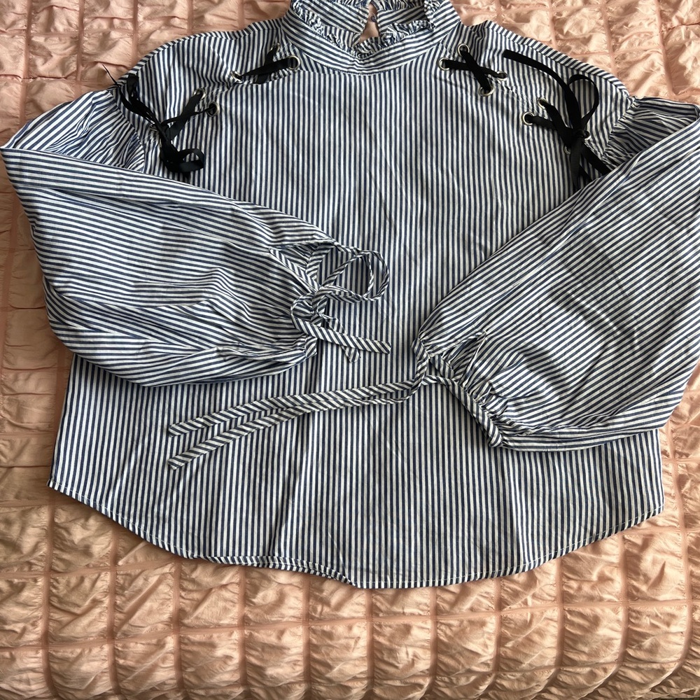 Zara navy and white stripe blouse with ribbon grommet detail at shoulders